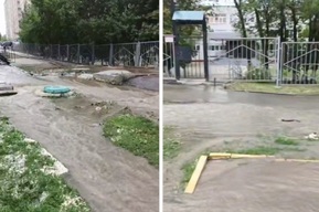 Саратовскую улицу залила бурная коммунальная река, преградившая дорогу к школе