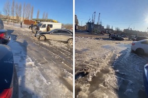 Из-за коммунальной аварии машины саратовцев оказались парализованы льдом (видео)