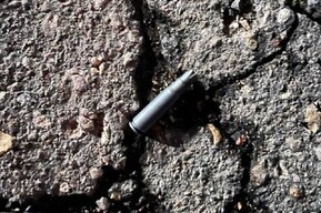 Под суд пойдёт мужчина, который сначала бросил в знакомого гранату, а потом расстрелял его