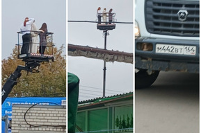 «Девочки на вышке»: жители Саратова засняли, как возле рядов Сенного рынка при помощи муниципальной техники катают трёх женщин