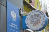 В регионе сотрудника ФНС из числа руководителей подозревают в получении взятки в миллион рублей
